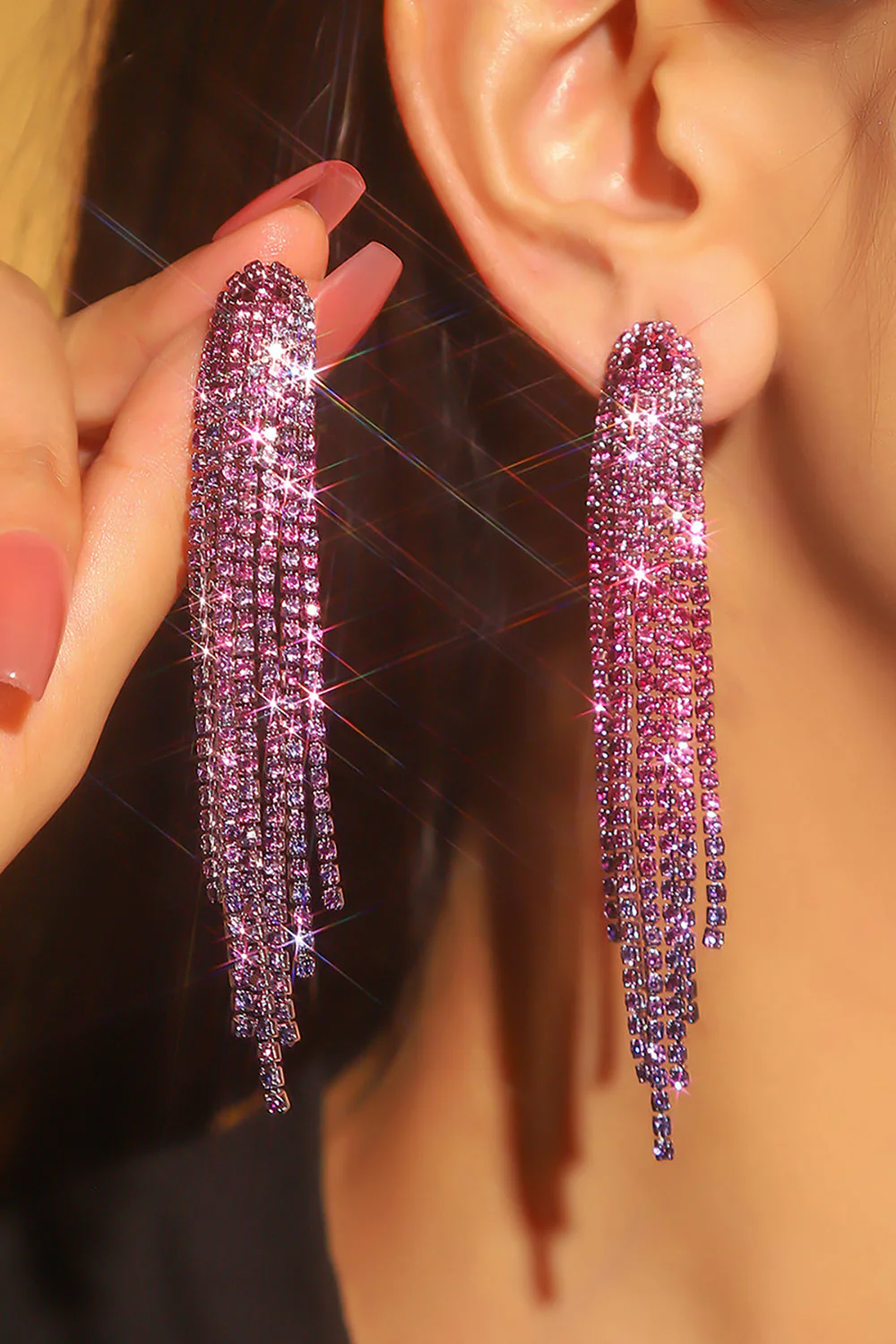 Boucles d’oreilles longues pompon strass brillant