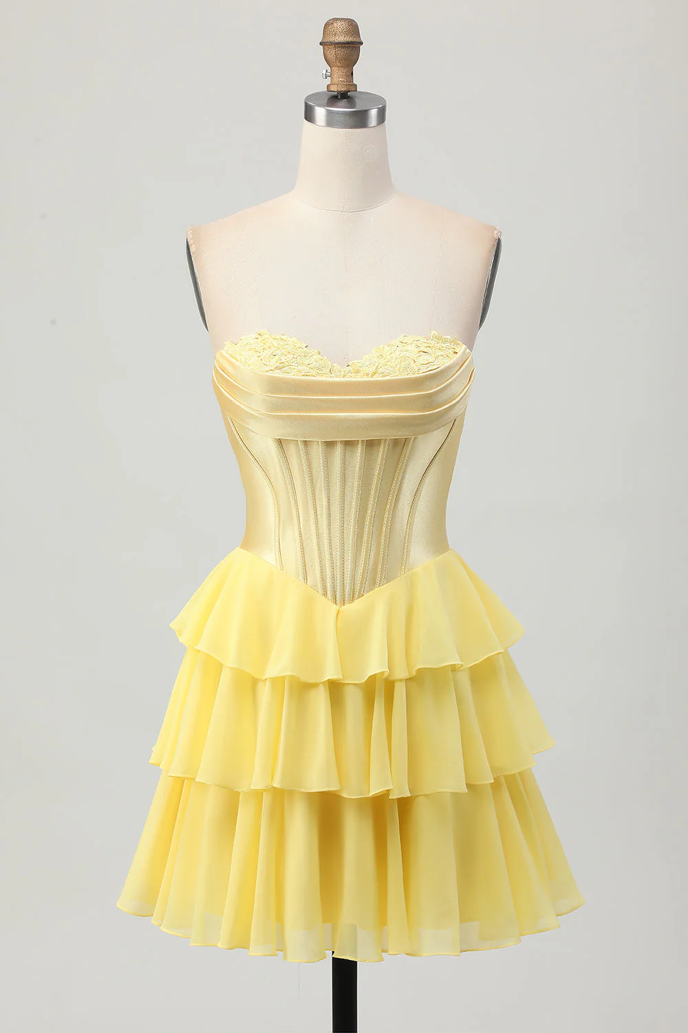 Corset bustier jaune Une robe de bal à plusieurs niveaux