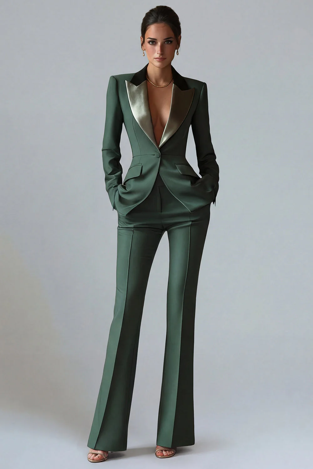 Costume d'affaires femme 2 pièces vert foncé revers pointe un bouton