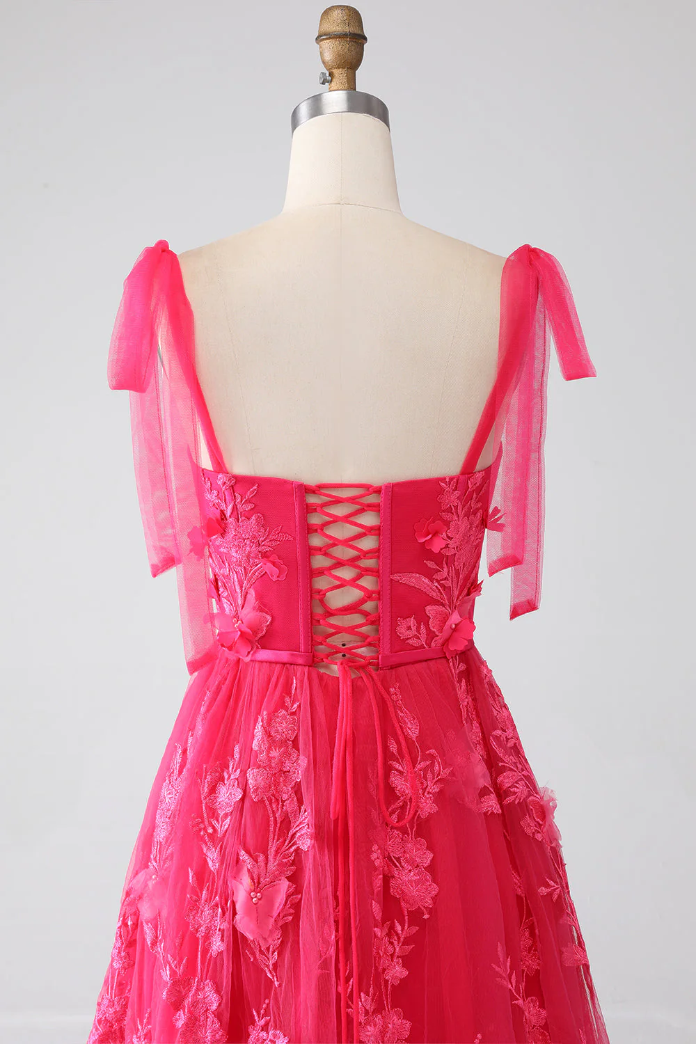 Robe de Soirée longue fuchsia à bretelles spaghetti et fente - Image 7