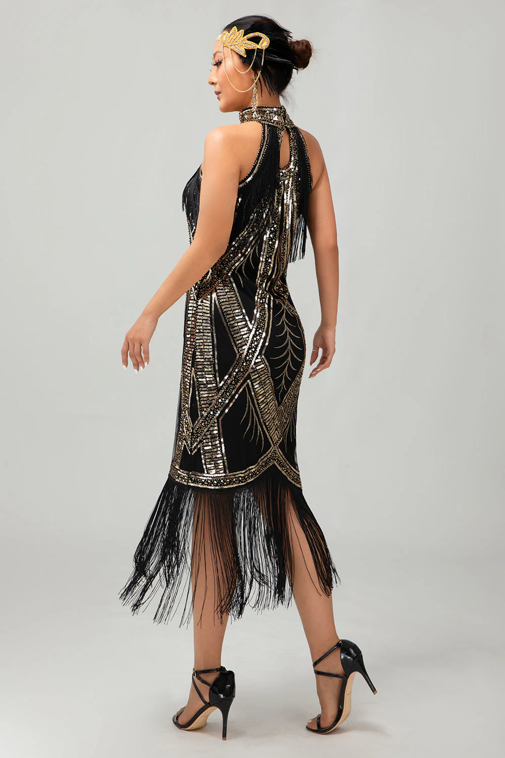 Robe style années 20 noire et dorée à franges et paillettes - Image 2