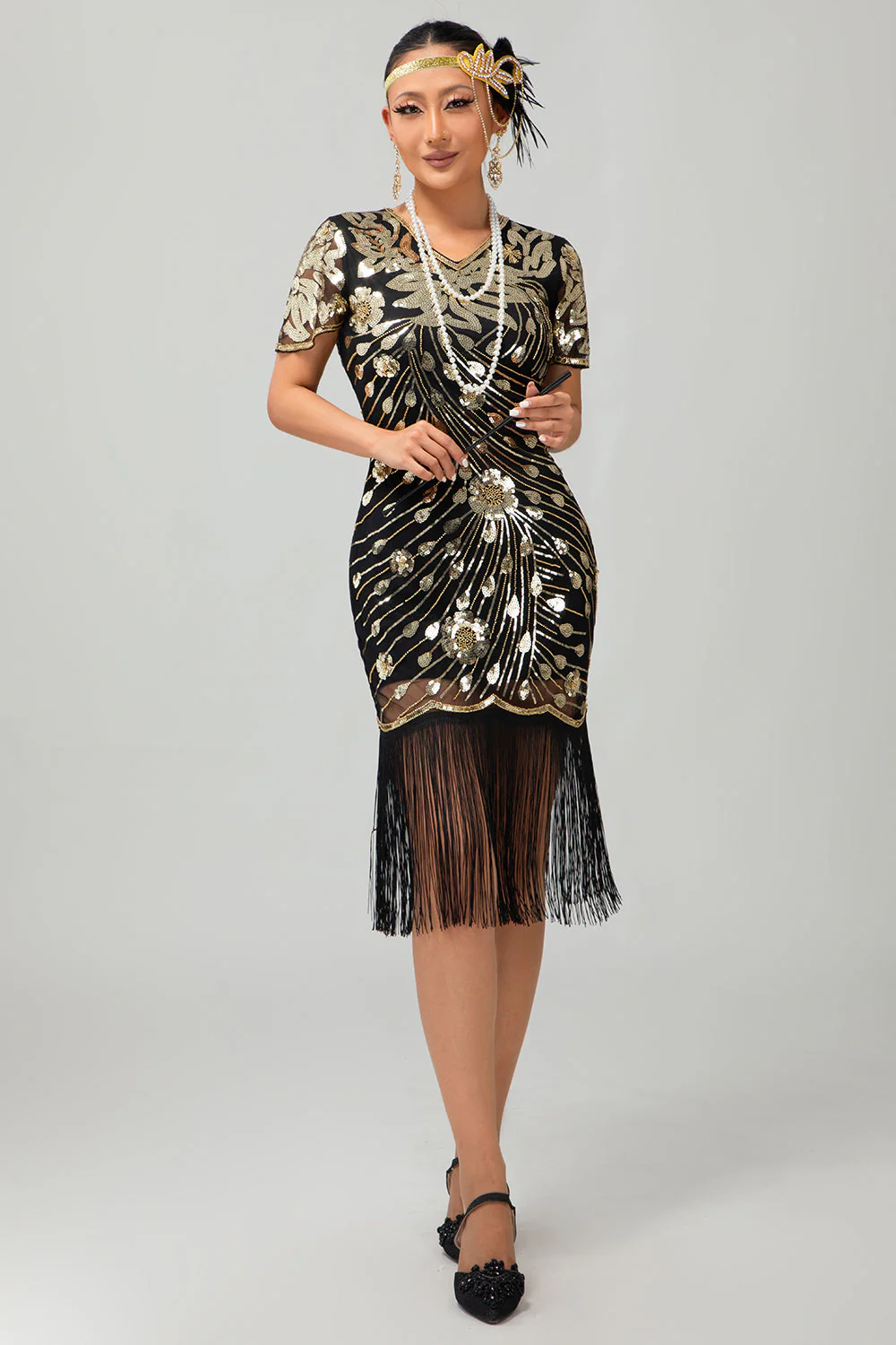 Robe noire à paillettes dorées des années 1920 avec franges - Image 4