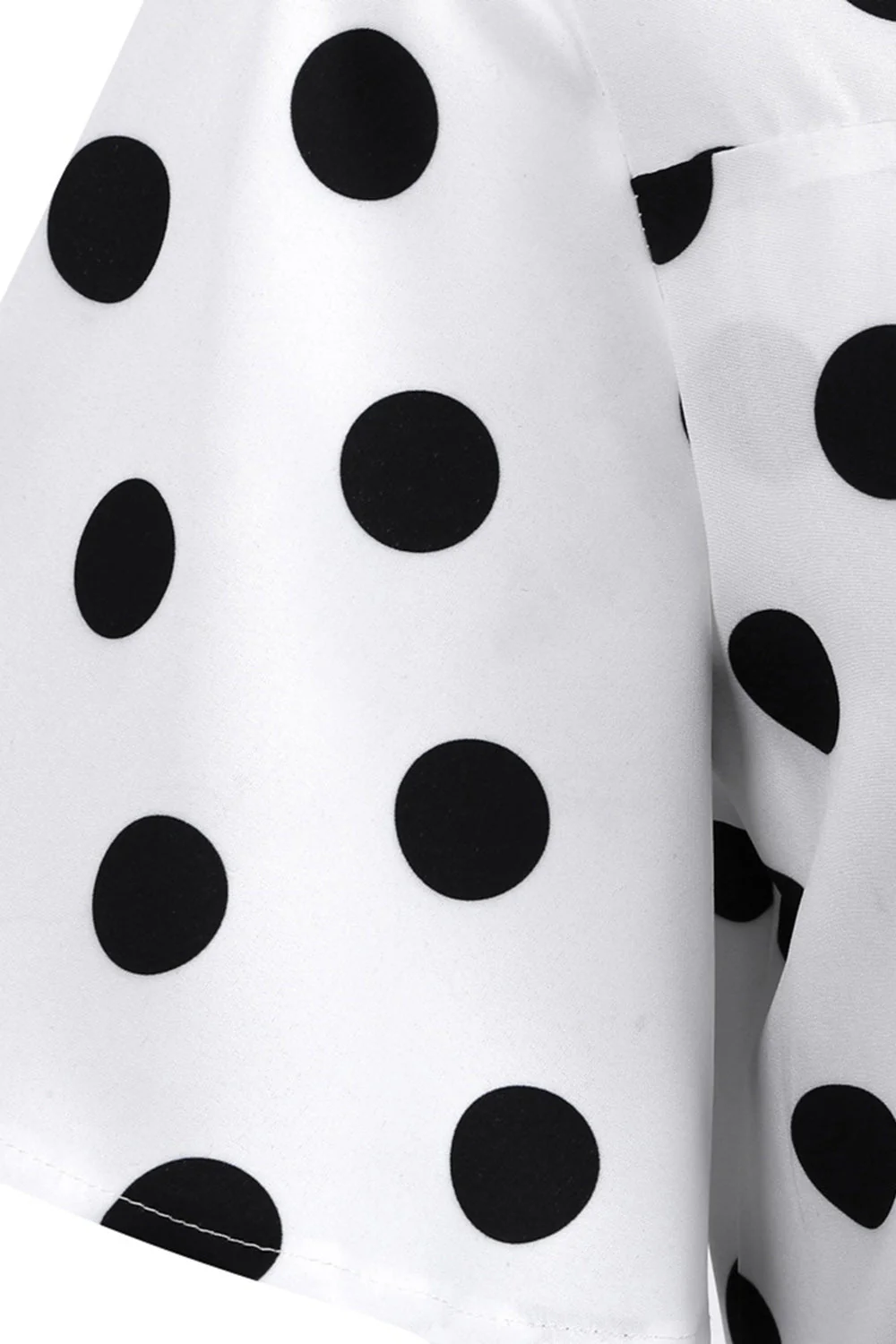 Robe vintage blanche à pois avec manches courtes - Image 4