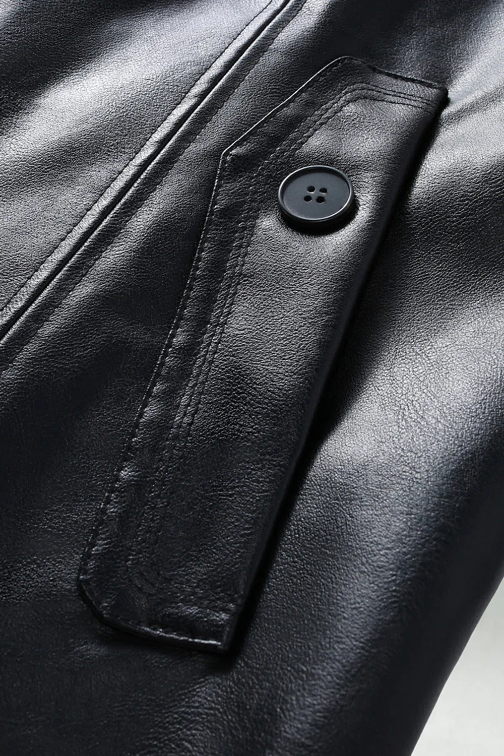 Trench-coat en cuir noir à revers avec ceinture - Image 2